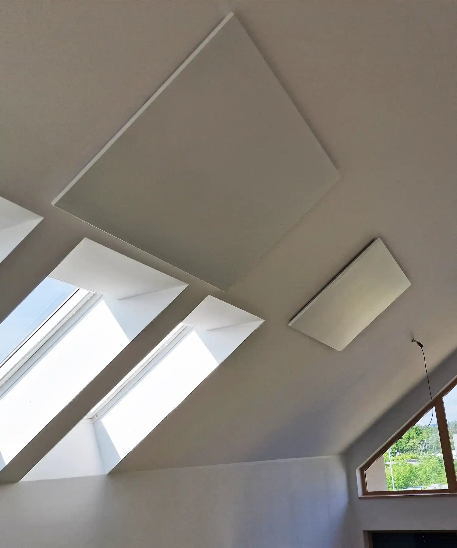 Kiasa's Eko infrared Panel Heater - Mounted on ceiling on a angled apex roof