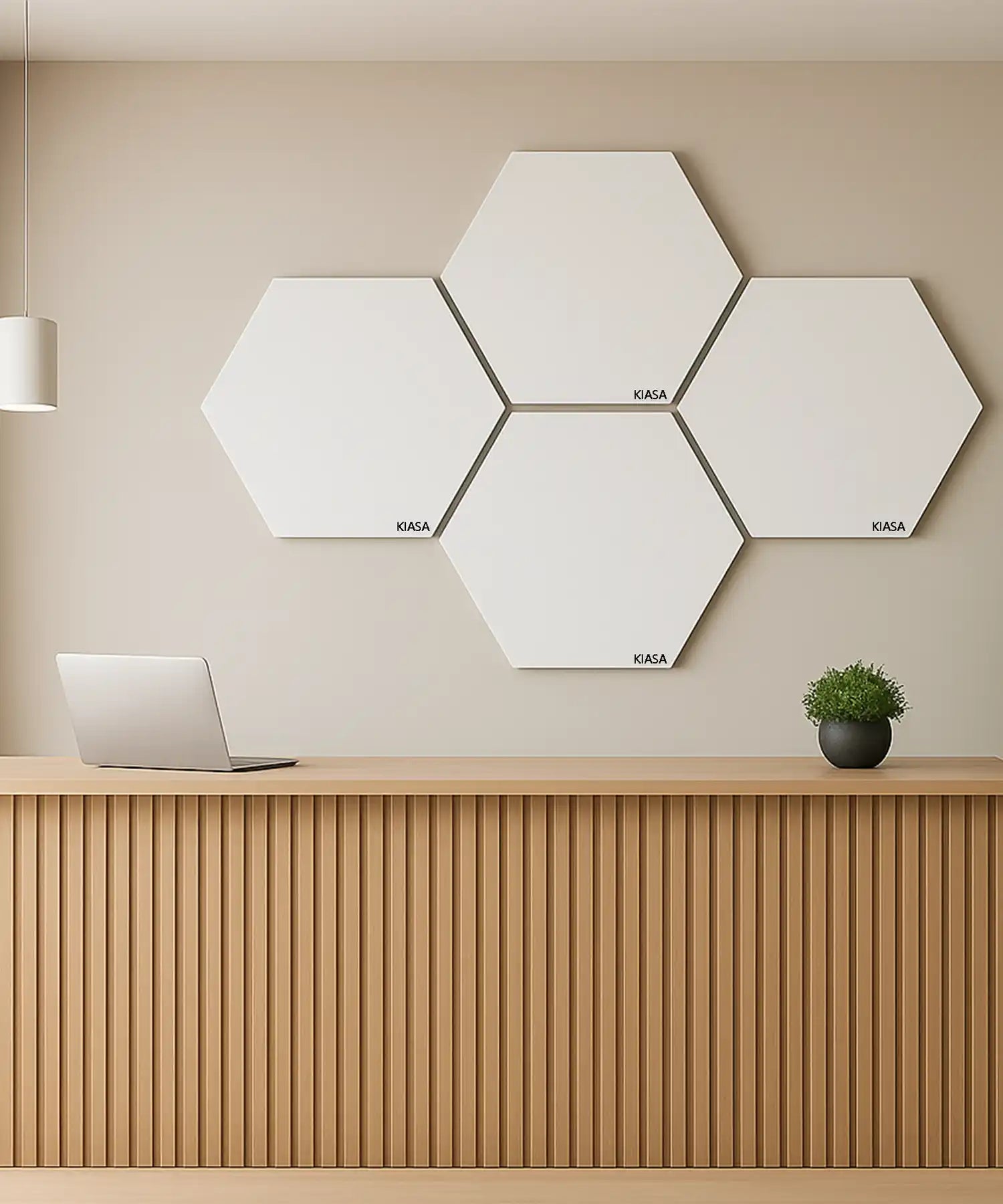 Modern reception desk with four hexagonal infrared heating panels arranged on the wall above, blending seamlessly with contemporary décor.