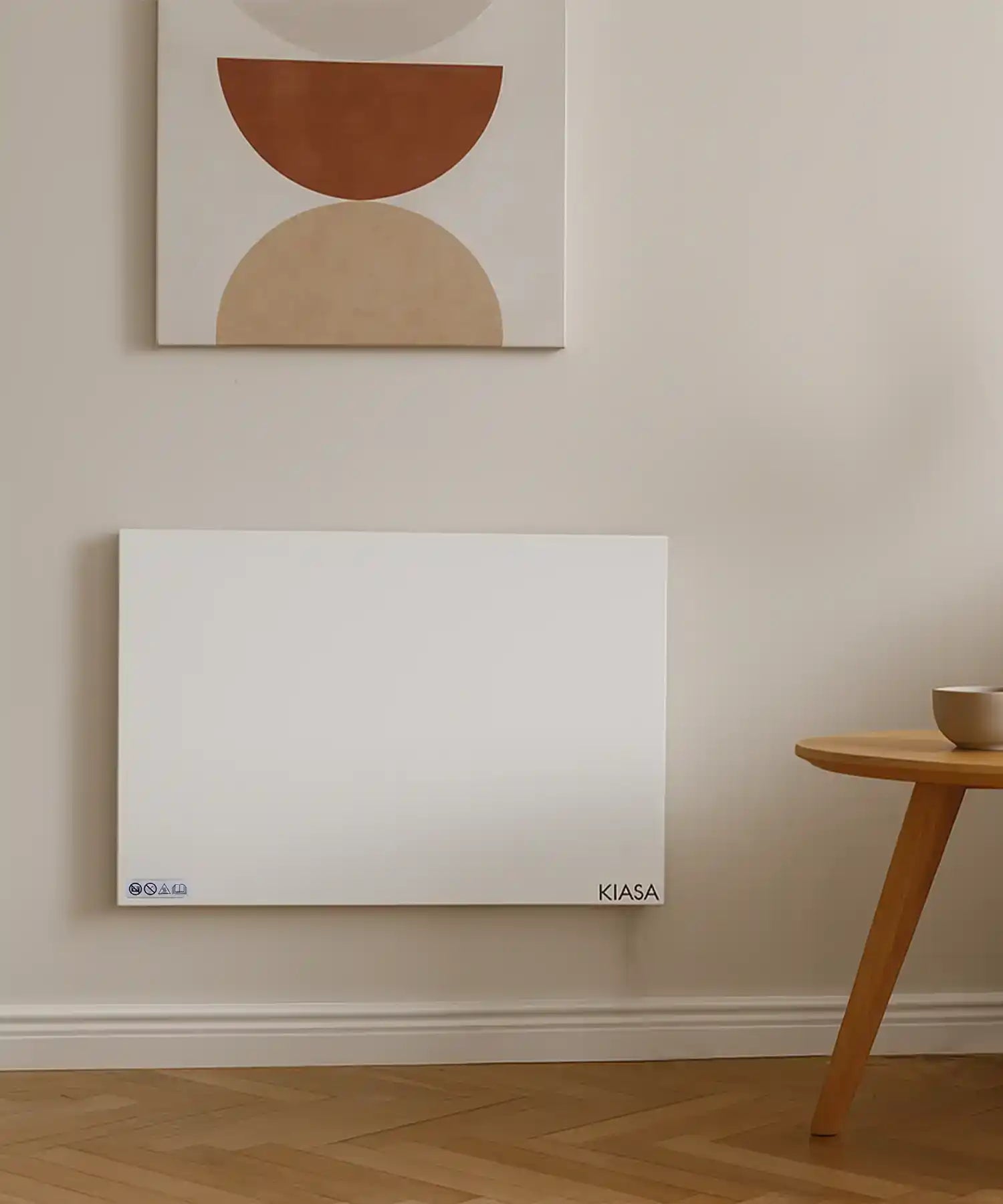 Kiasa Kore Hybrid Heater mounted in a minimalist living space with geometric wall art