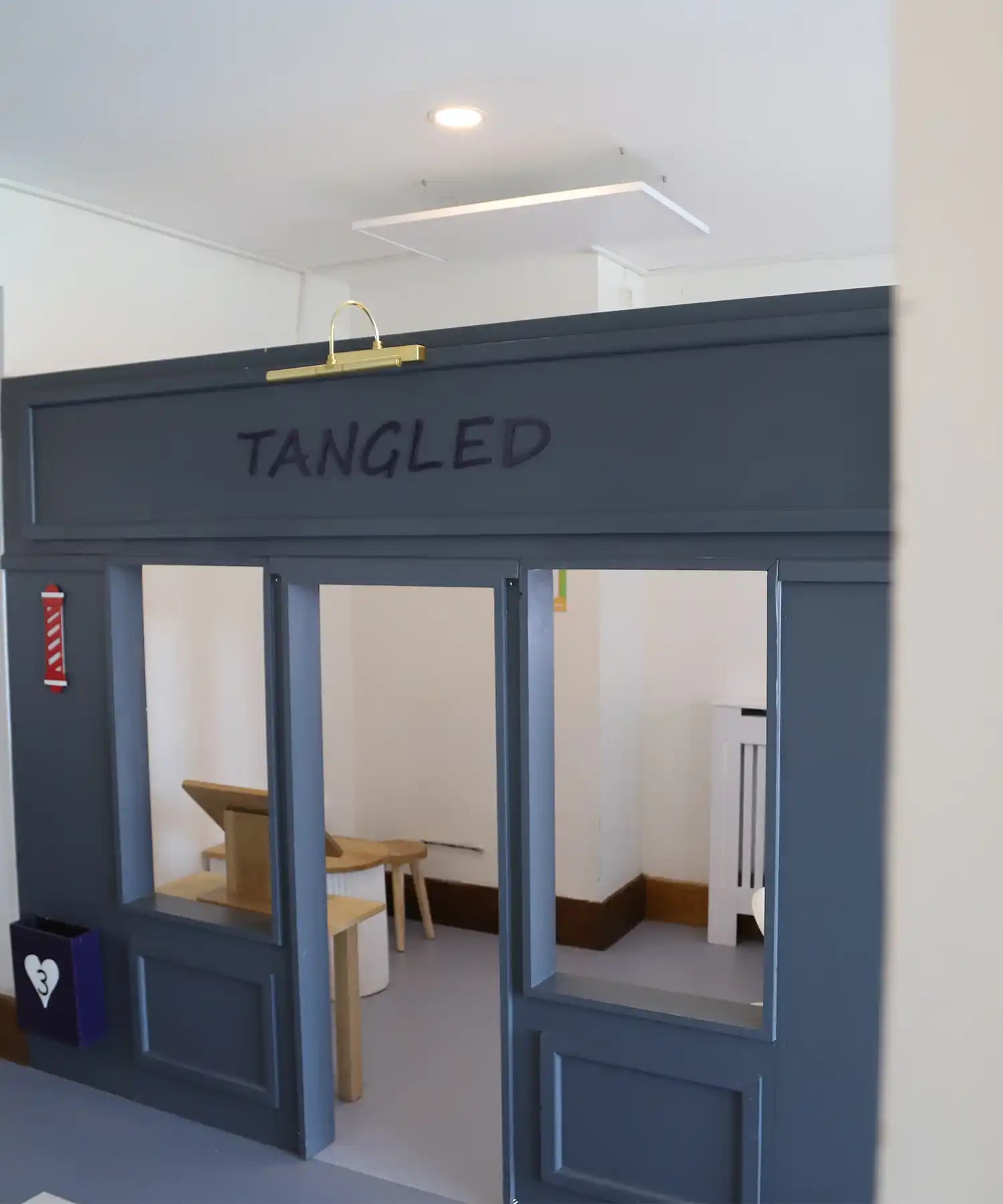 A playroom inside Little Foxes Play Town, with a KIASA infrared panel mounted overhead for safe, even heating in a themed learning zone.