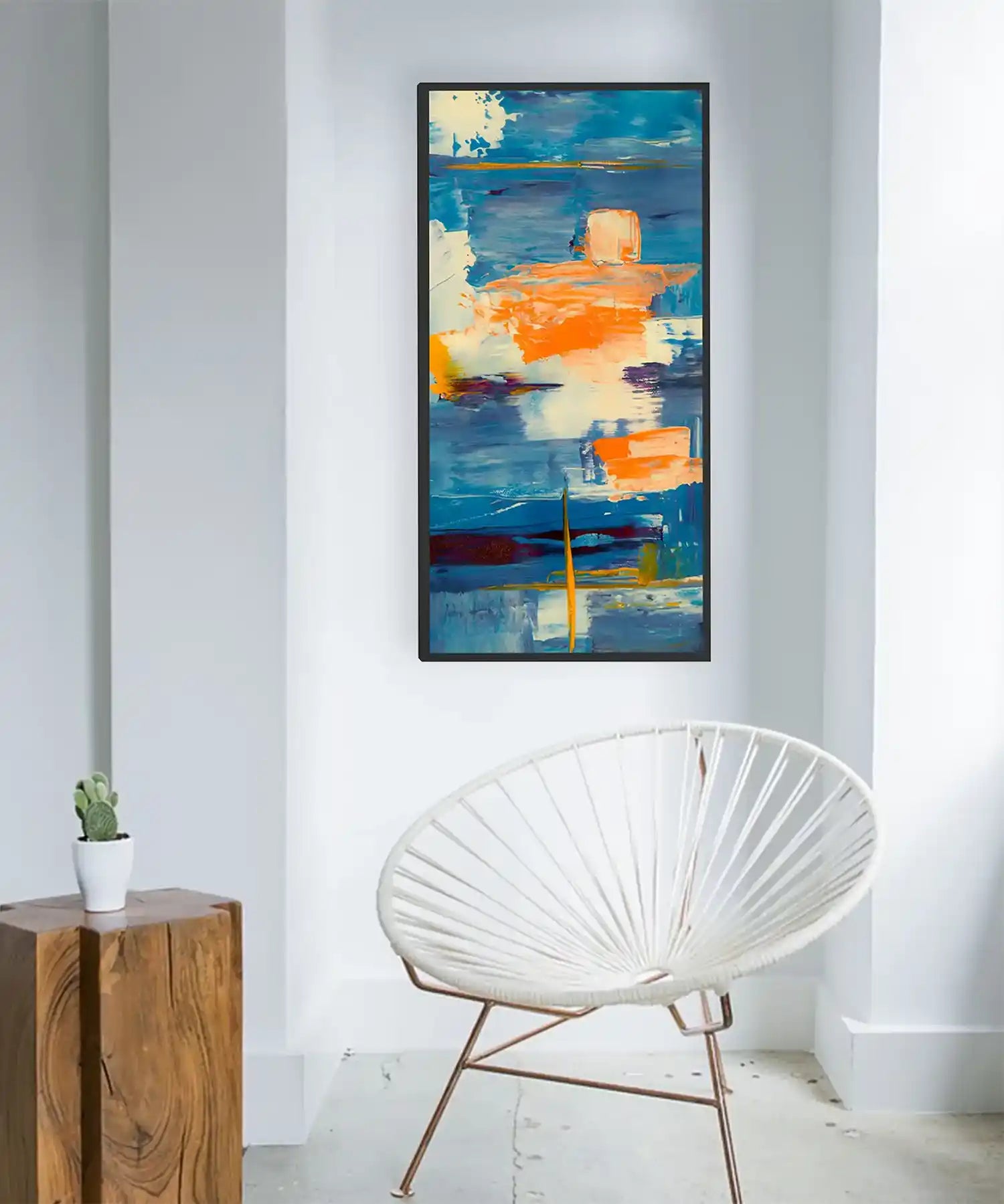 Modern abstract picture infrared panel heater in a minimalist hallway with white chair and wood side table – doubles as artwork and heating