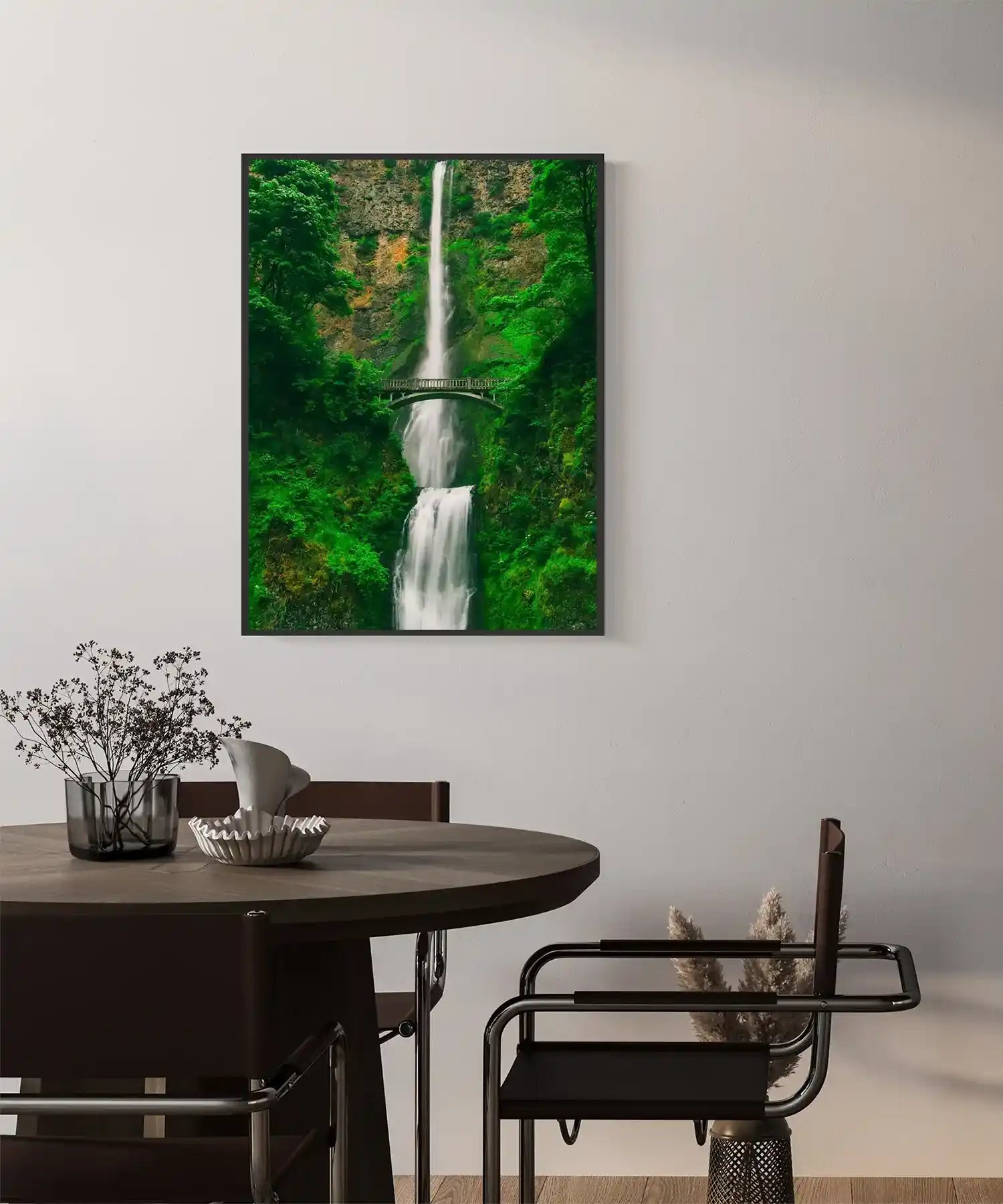 Infrared heater disguised as a waterfall picture panel, mounted in a cosy neutral-toned room with modern furniture and natural textures