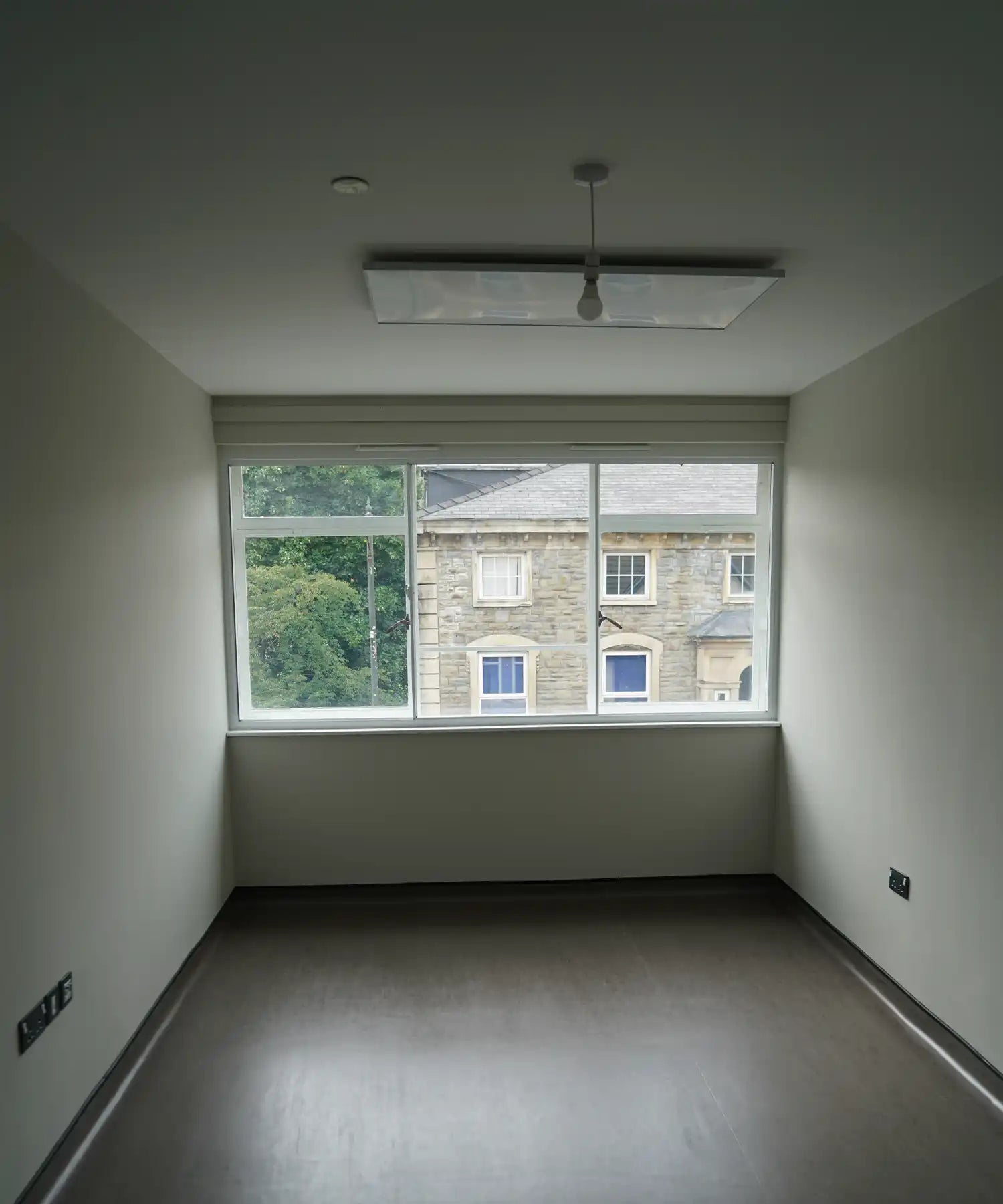 Modern wall-mounted Kiasa infrared panel heater providing sleek and silent home heating solution