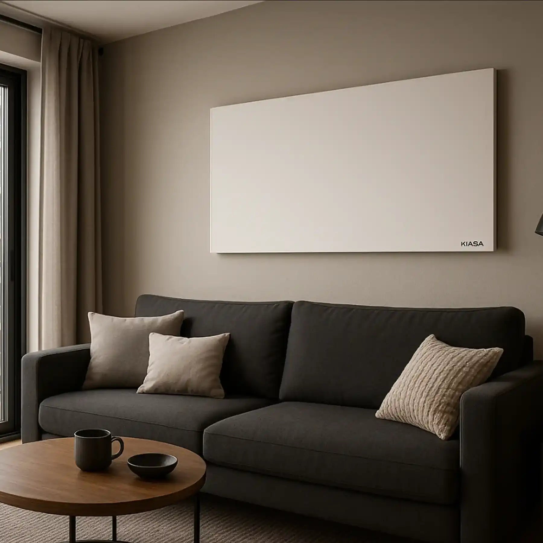 Ceiling-mounted Kiasa infrared heating panels installed in a white residential room with soft lighting and minimal décor.