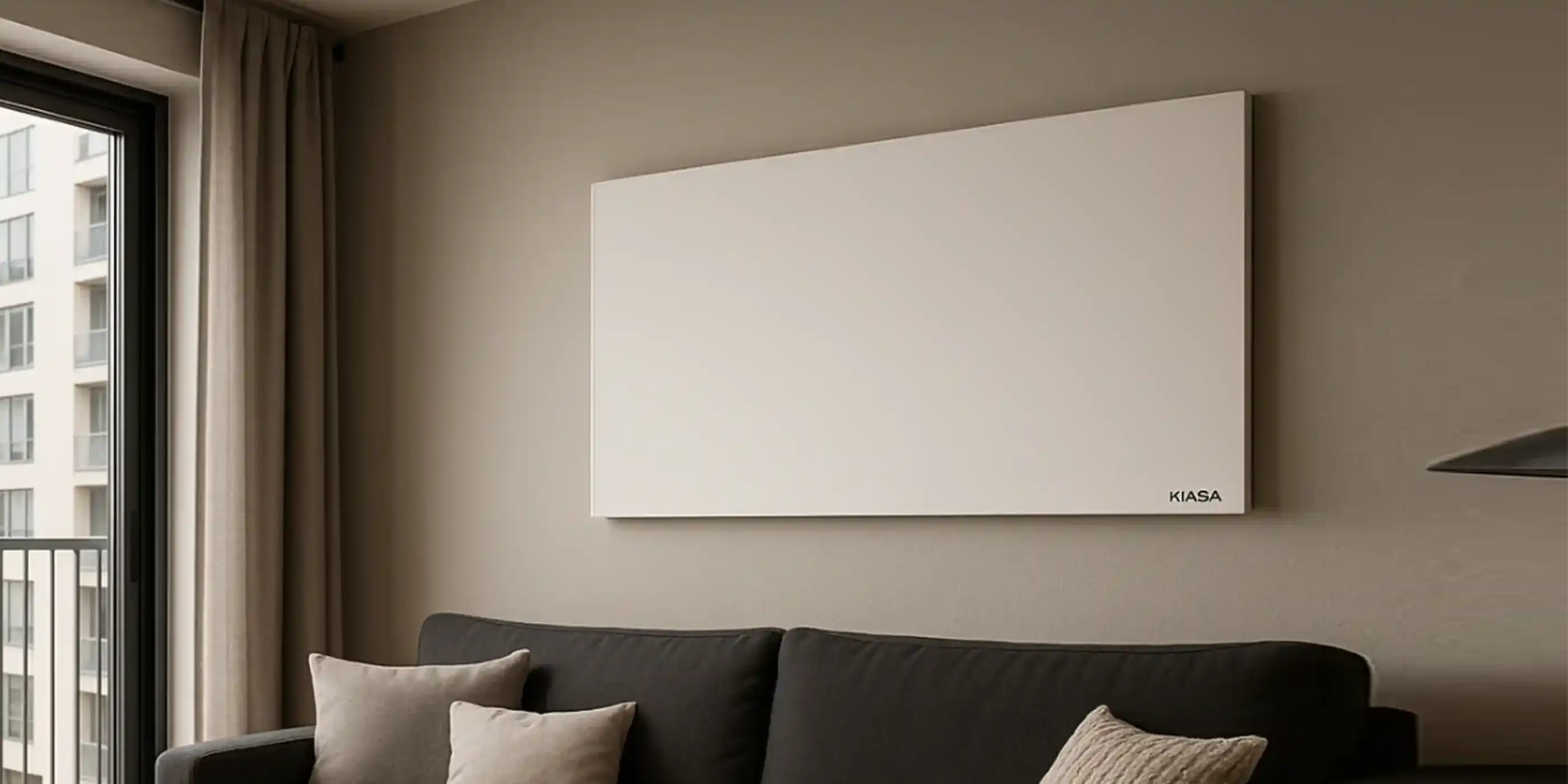 Ceiling-mounted Kiasa infrared heating panels installed in a white residential room with soft lighting and minimal décor.