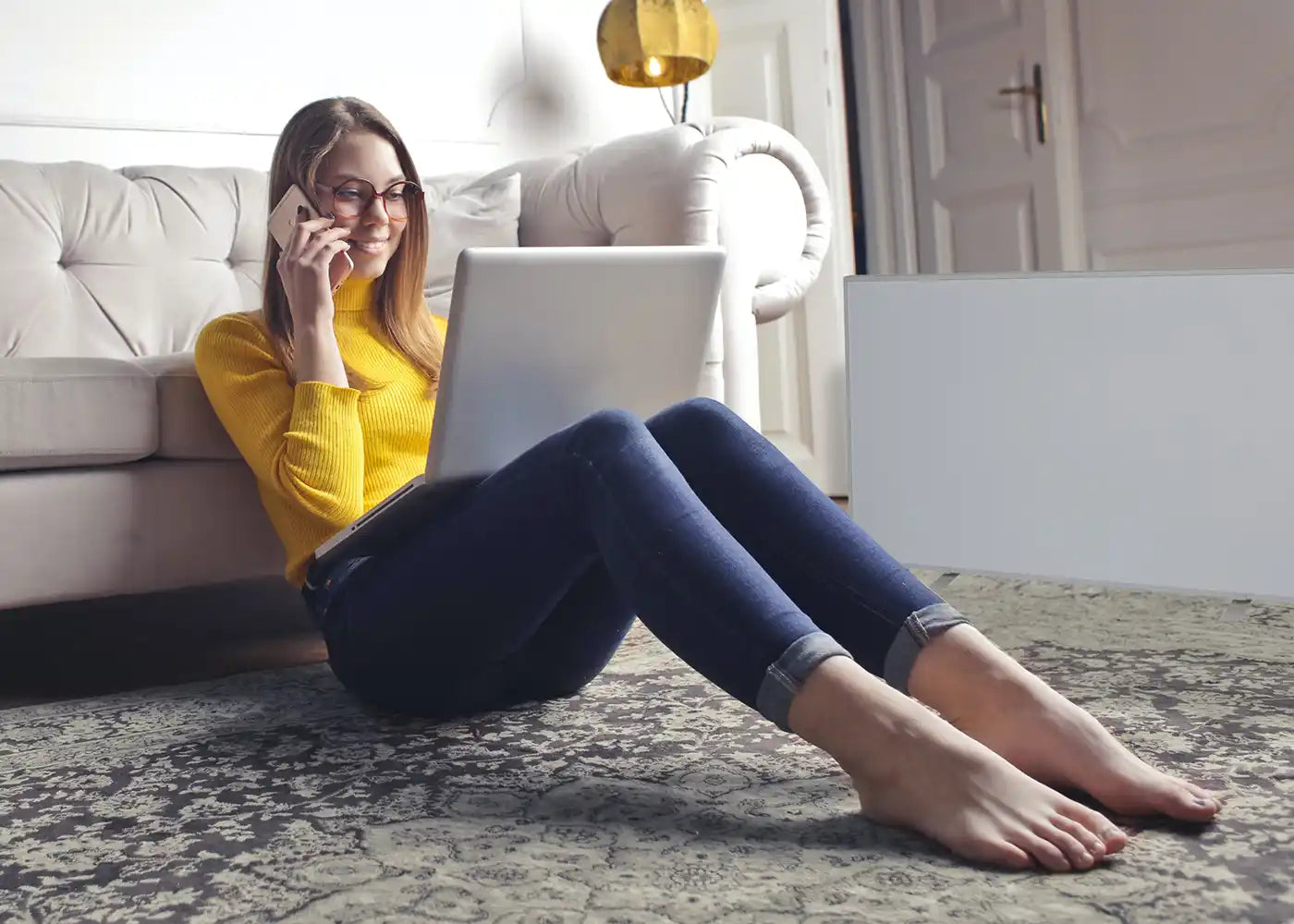 Lady in apartment/flat working from home with 720w portable smart panel