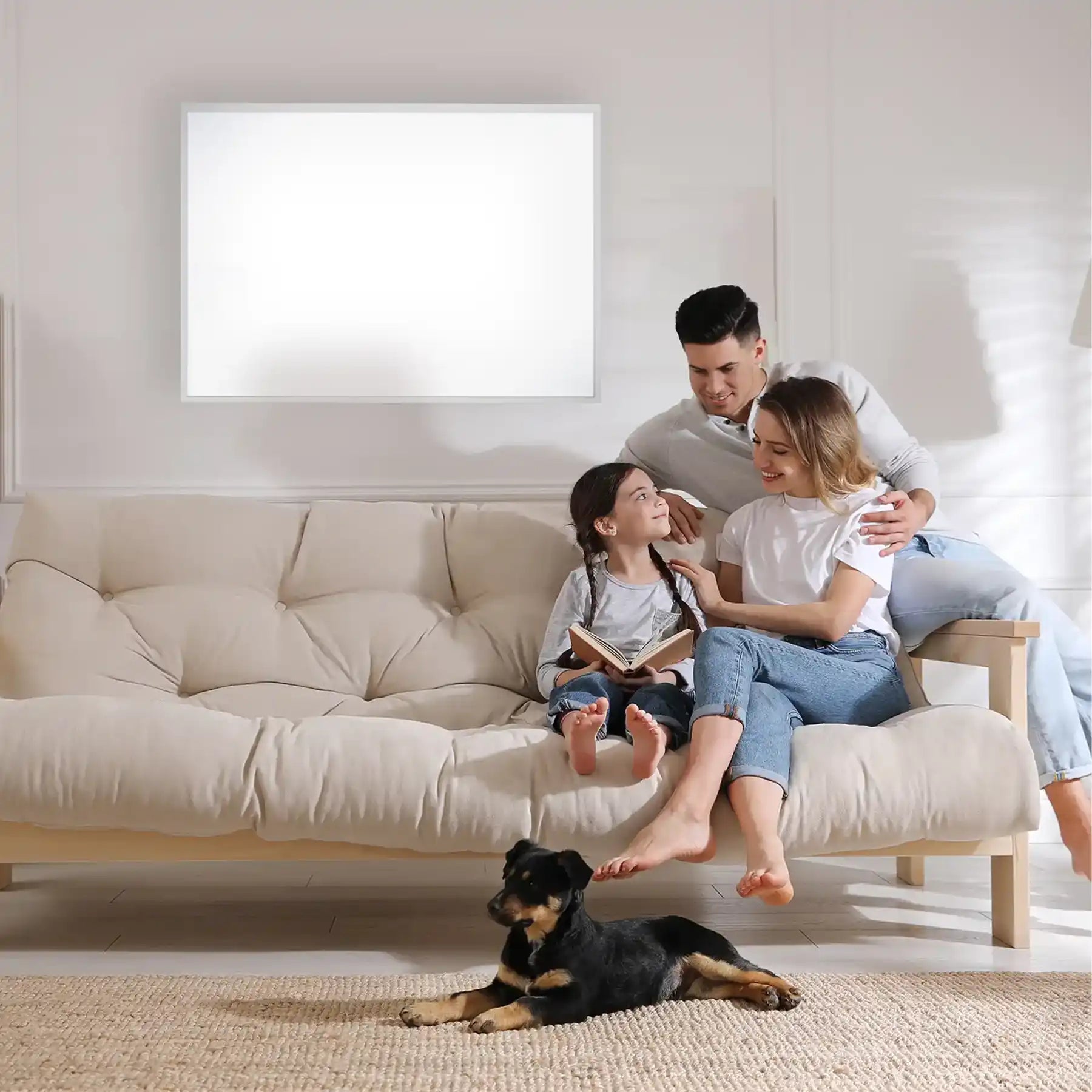 Family and dog enjoying warmth from Smart IR Panel mounted on the wall behind them