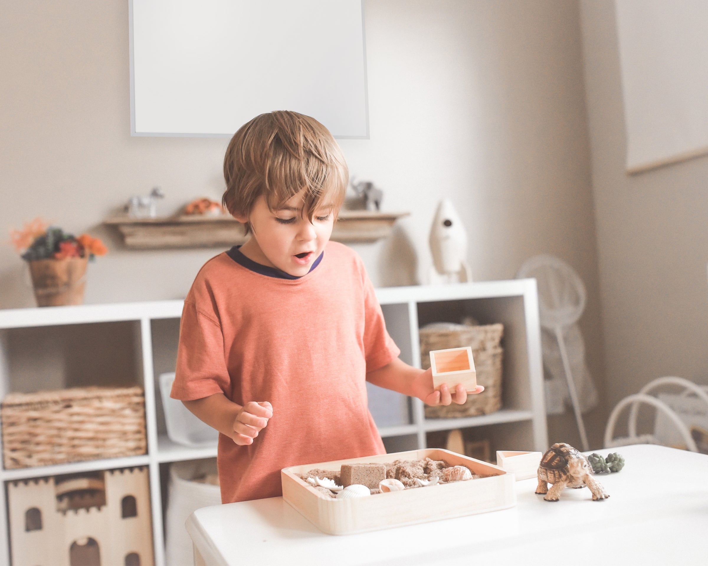 Child playing safely near 350W Kiasa infrared heater in home environment