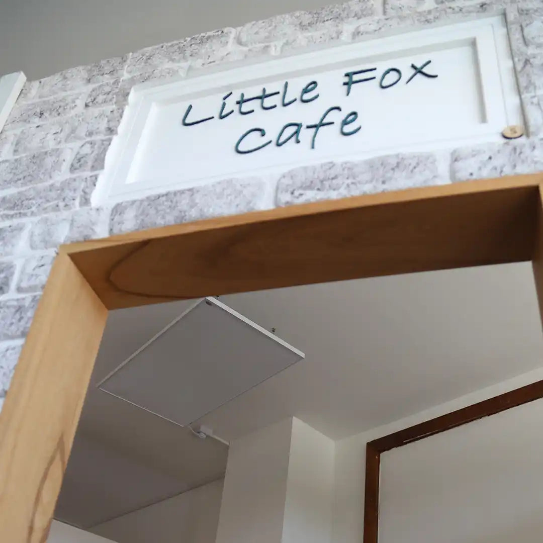 Cozy café interior heated with Kiasa infrared panels creating a warm and inviting dining atmosphere