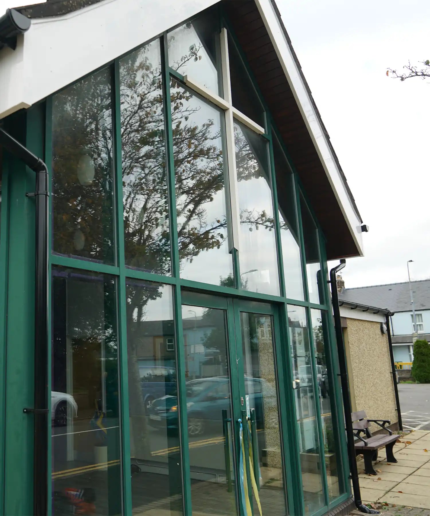 Outdoor infrared heater illuminating a roadside space with warm ambient comfort at night