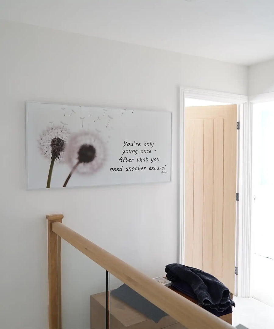 Modern room heated by Kiasa EKO infrared panel with sleek finish