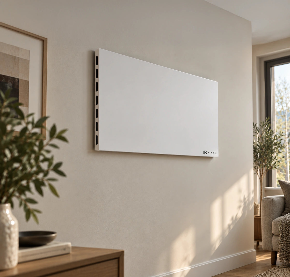 Kiasa Kore Hybrid infrared panel heater wall-mounted in a living room