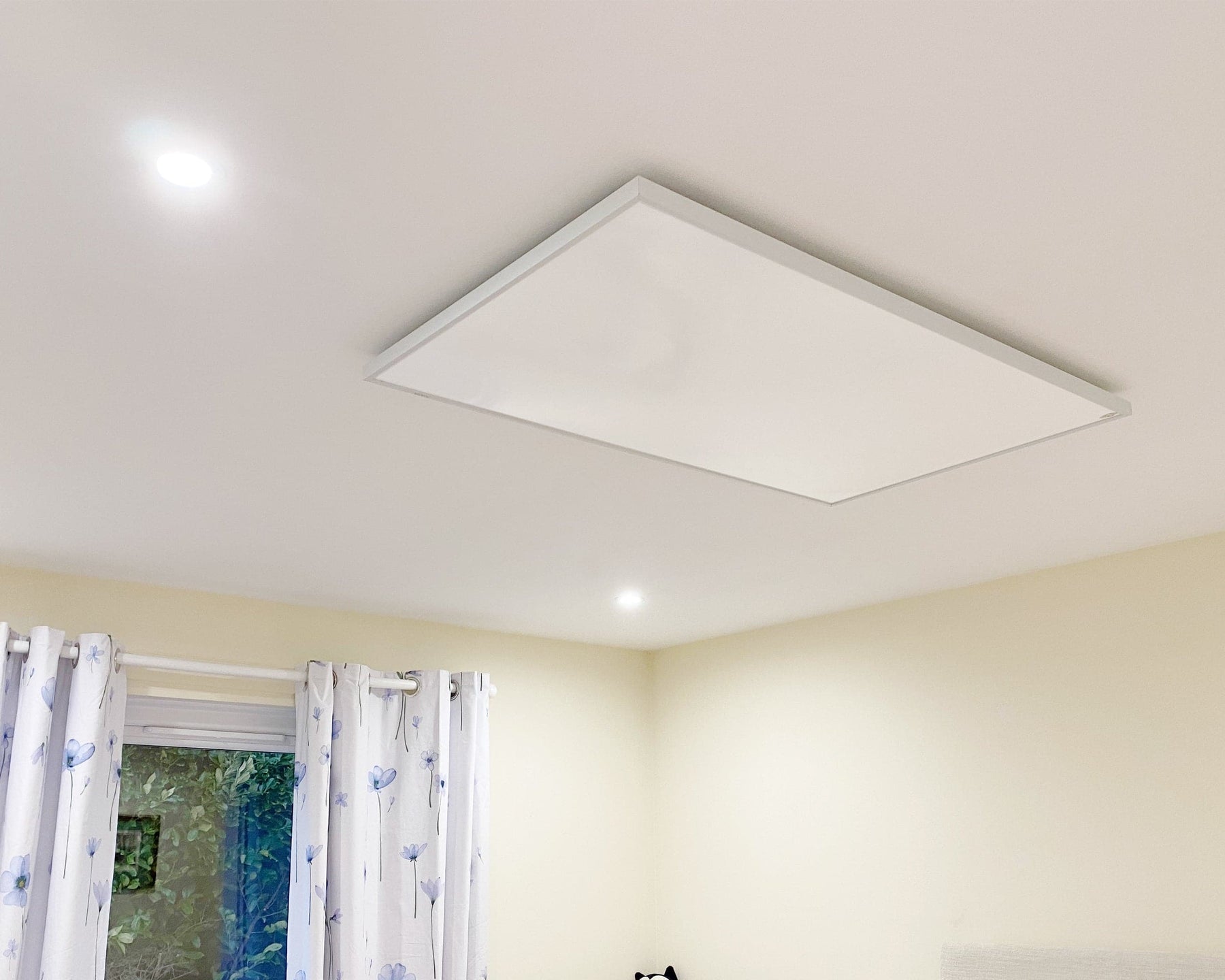 Kiasa 720W Infrared Panel - 100cm x 60cm - Ceiling Mounted in the hall room.