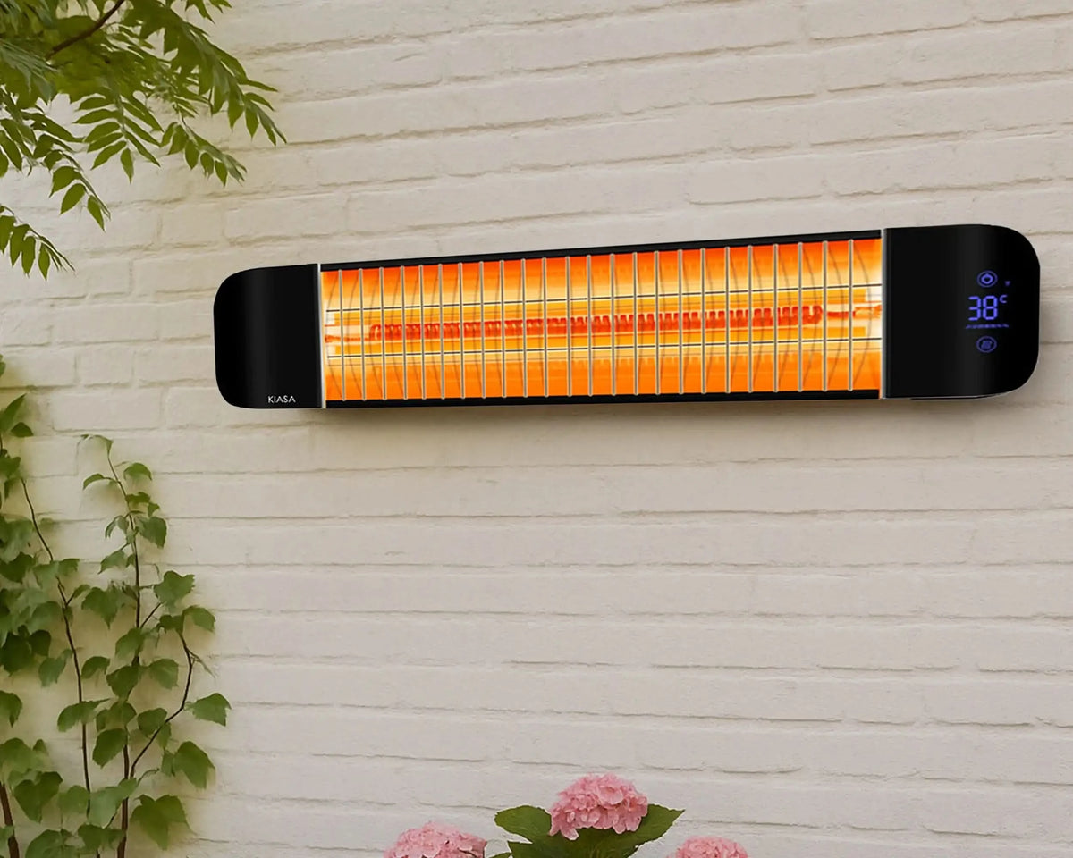KIASA Sona outdoor infrared heater on a white garden wall with the temperature display lit