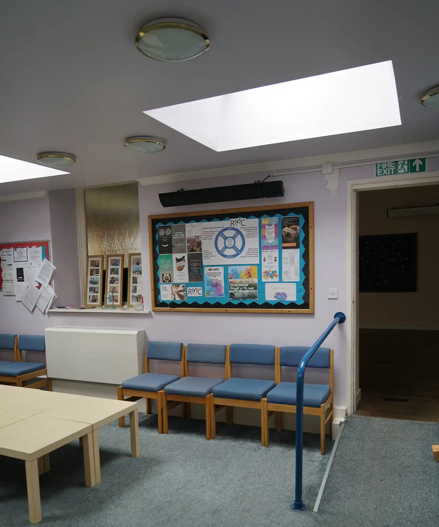 Modern infrared heater installed on exterior wall ensuring efficient outdoor heating performance
