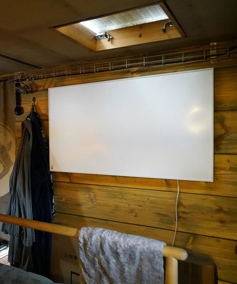 Side angle view of Rupert infrared heater panel emphasizing slim and unobtrusive profile